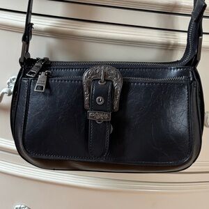 Steve Madden purse. Like new condition held once.